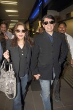 Madhuri dixit snapped with husband in Mumbai Airport on 6th April 2012 (23).jpg